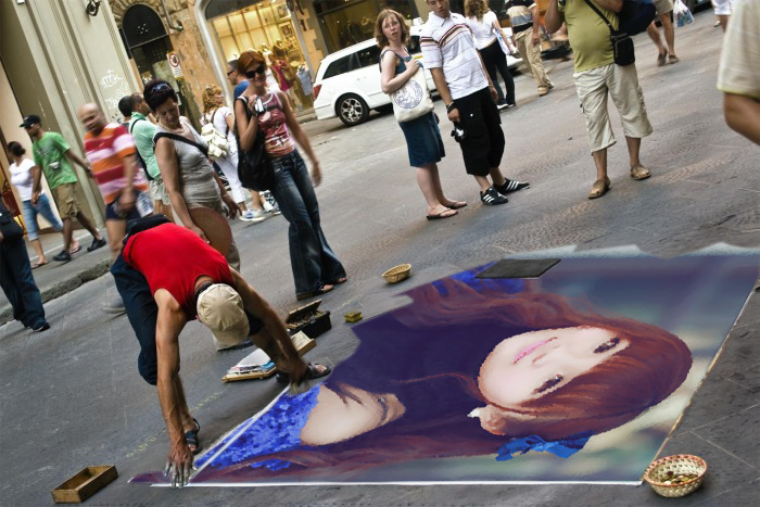 街头艺术家画你的照片